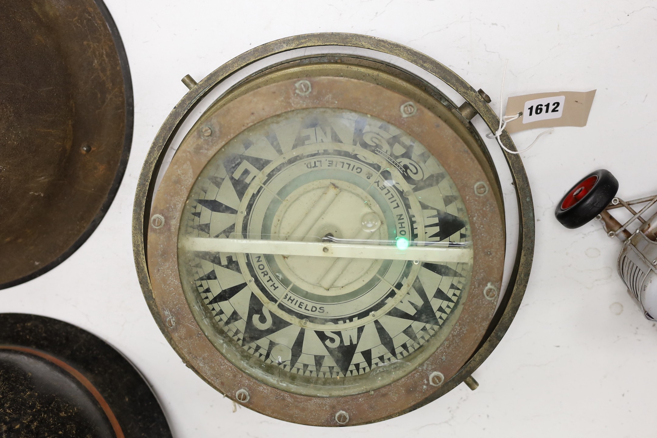 A John Lilley & Gillie ship's brass water compass, 31cm diam.